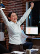 Cheerful employee exulting from joy, feeling excited after learning of upcoming promotion