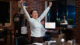 Cheerful employee exulting from joy, feeling excited after learning of upcoming promotion